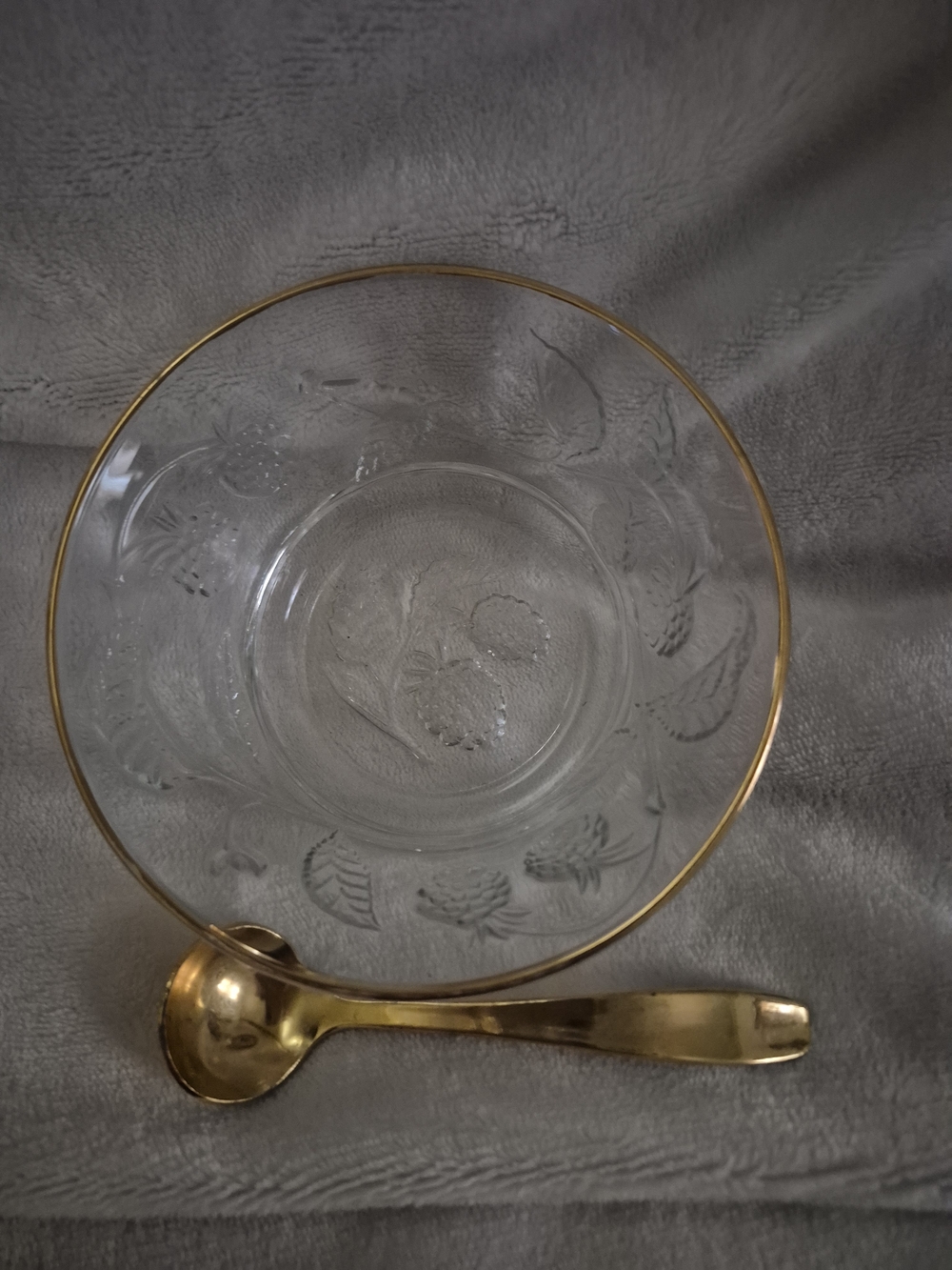 Clear Glass Serving Bowl with Gold Rim and Gold Spoon